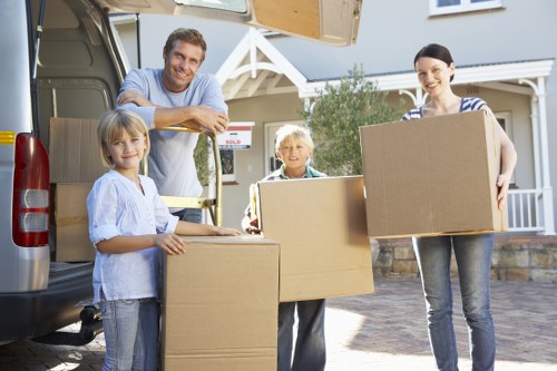 Removal team planning a move in Barnes residential street