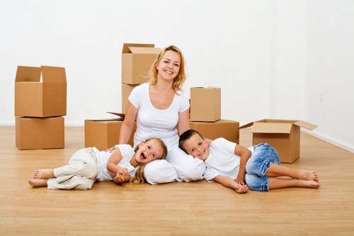 Delivery crew handling furniture and fragile goods with care